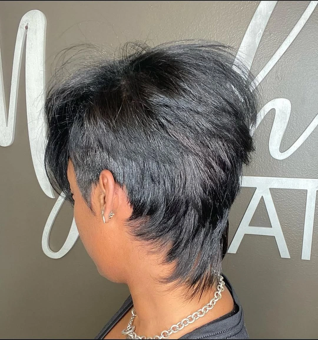 beautiful and trendy haircuts for black women 2027 Layered Pixie Mullet with Sleek Volume
