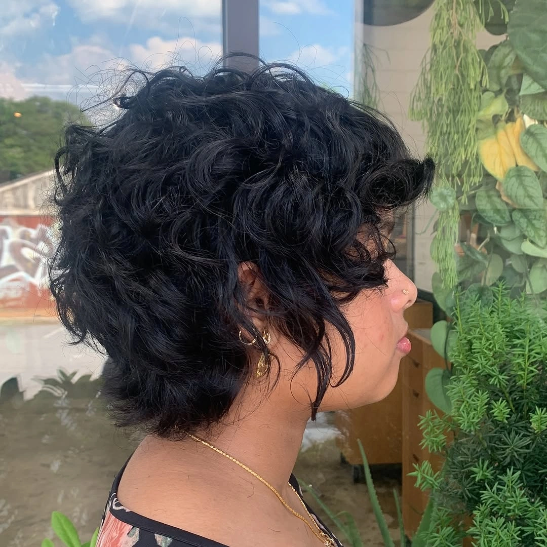 beautiful and trendy haircuts for black women 2027 Tousled Curly Shag Crop with Layered Texture