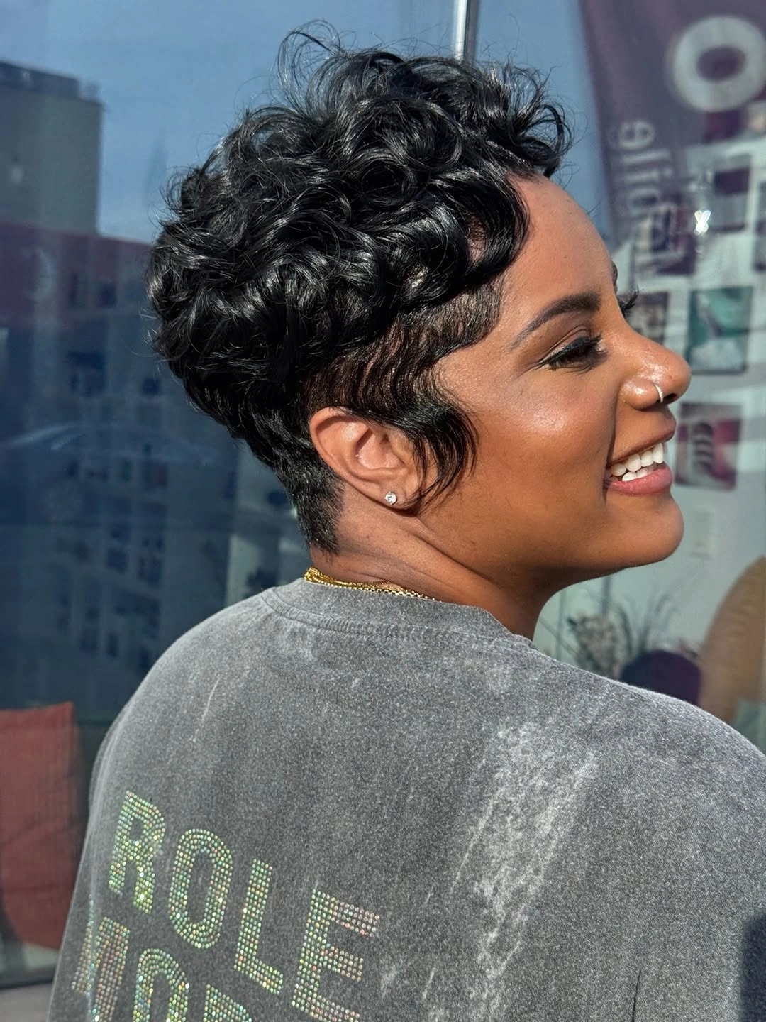 beautiful and trendy haircuts for black women 2027 Voluminous Curly Pixie with Face-Framing Curls