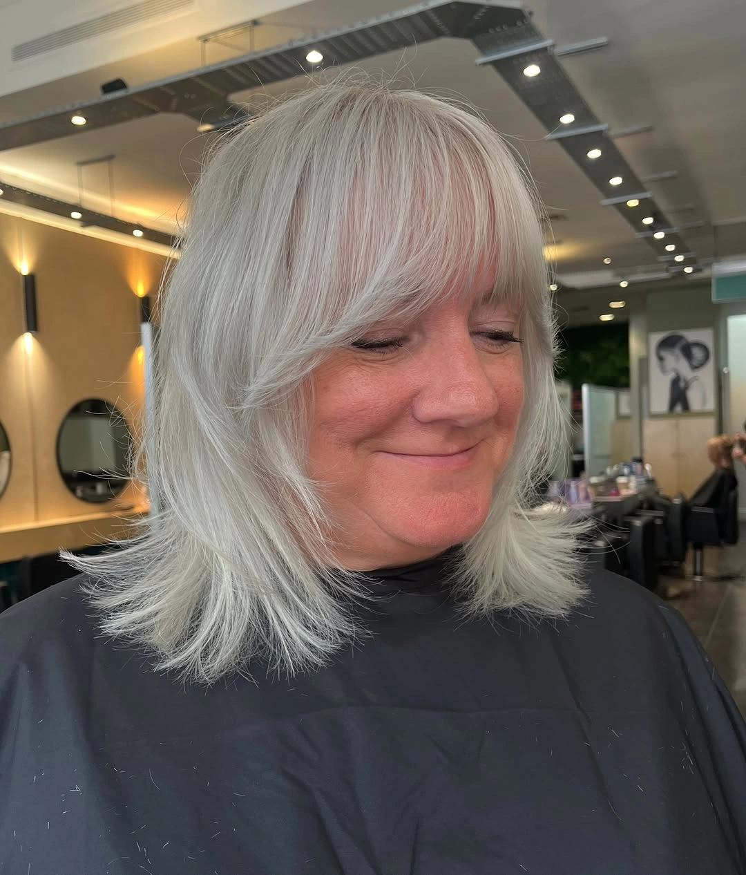 beautiful and trendy haircuts for women over 50 2027 Silver Shag With Feathered Bangs
