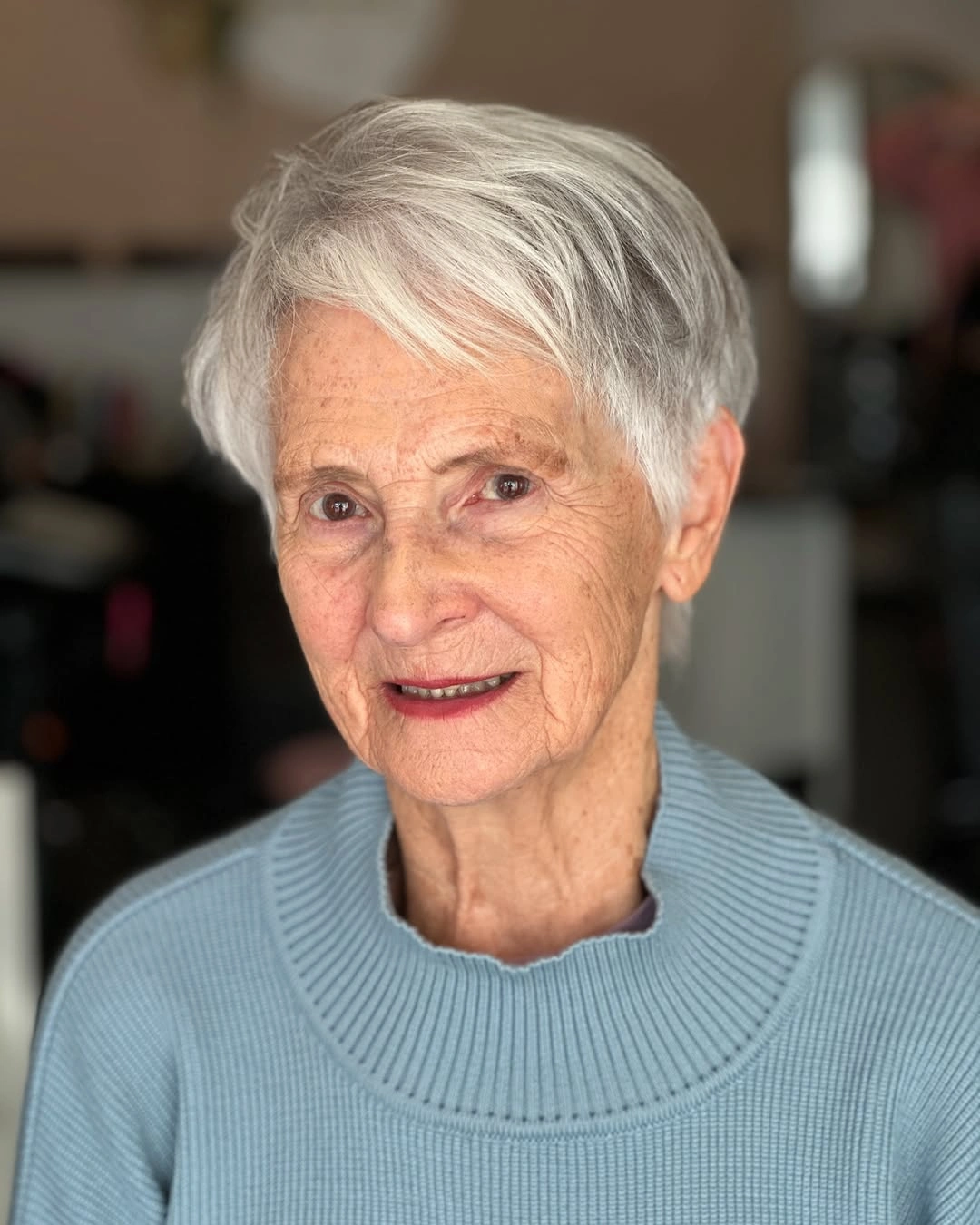 beautiful and trendy haircuts for women over 50 2027 Elegant Short Pixie With Side Swept Texture