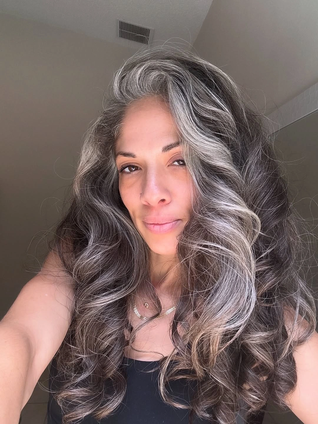 beautiful and trendy haircuts for women over 50 2027 Long Gray Waves With Statement Volume