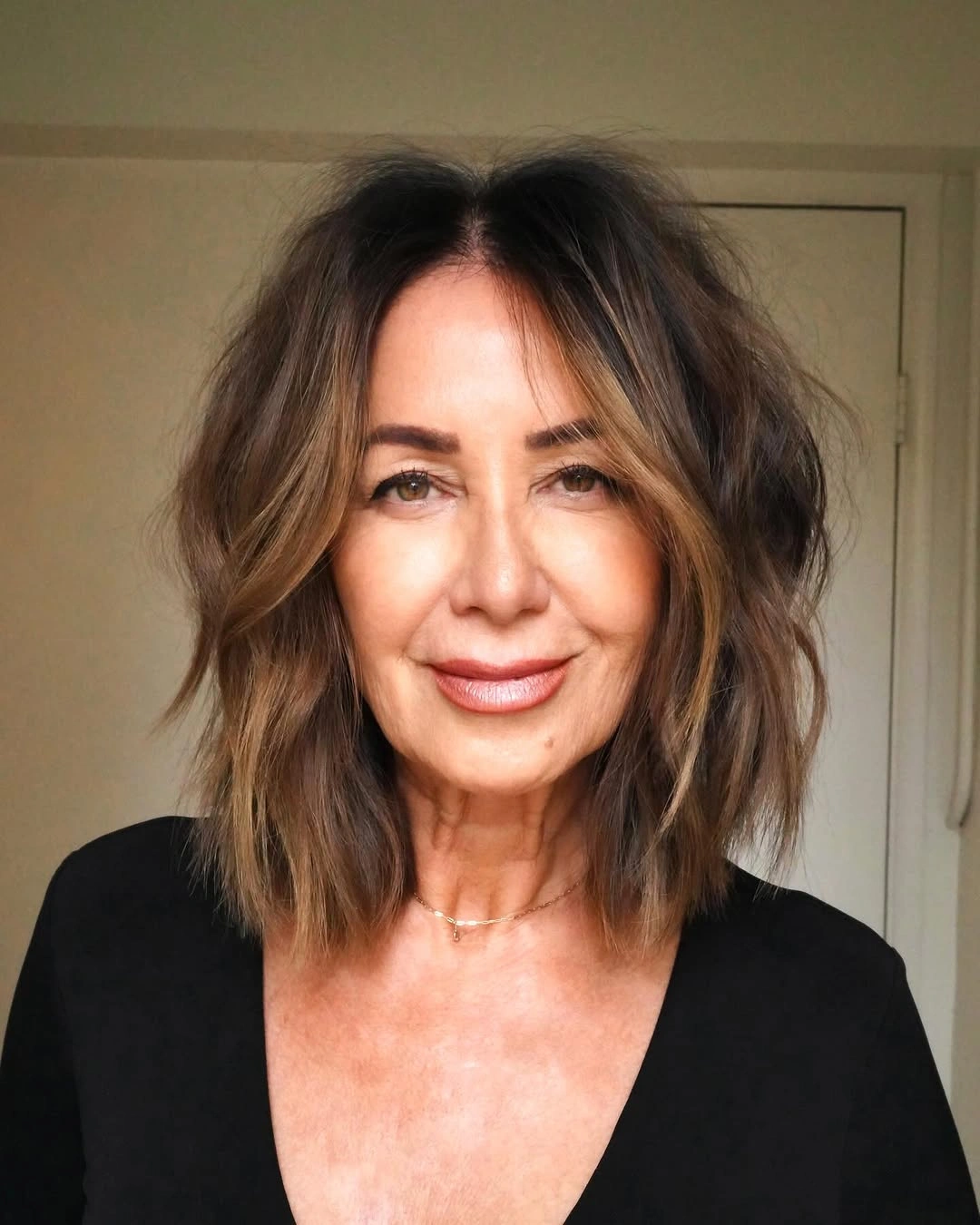 beautiful and trendy haircuts for women over 50 2027 Textured Medium Bob With Curtain Bangs