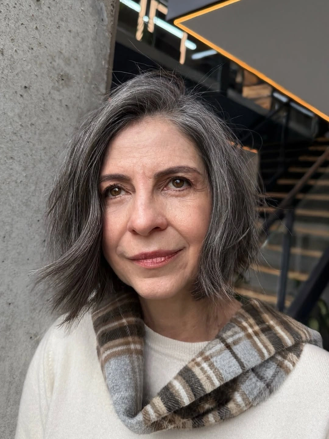 beautiful and trendy haircuts for women over 50 2027 Natural Gray Mid Length Bob With Effortless Movement