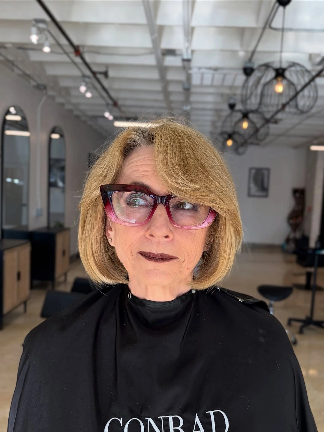 beautiful and trendy haircuts for women over 50 2027 Polished Short Bob With Side Swept Layers
