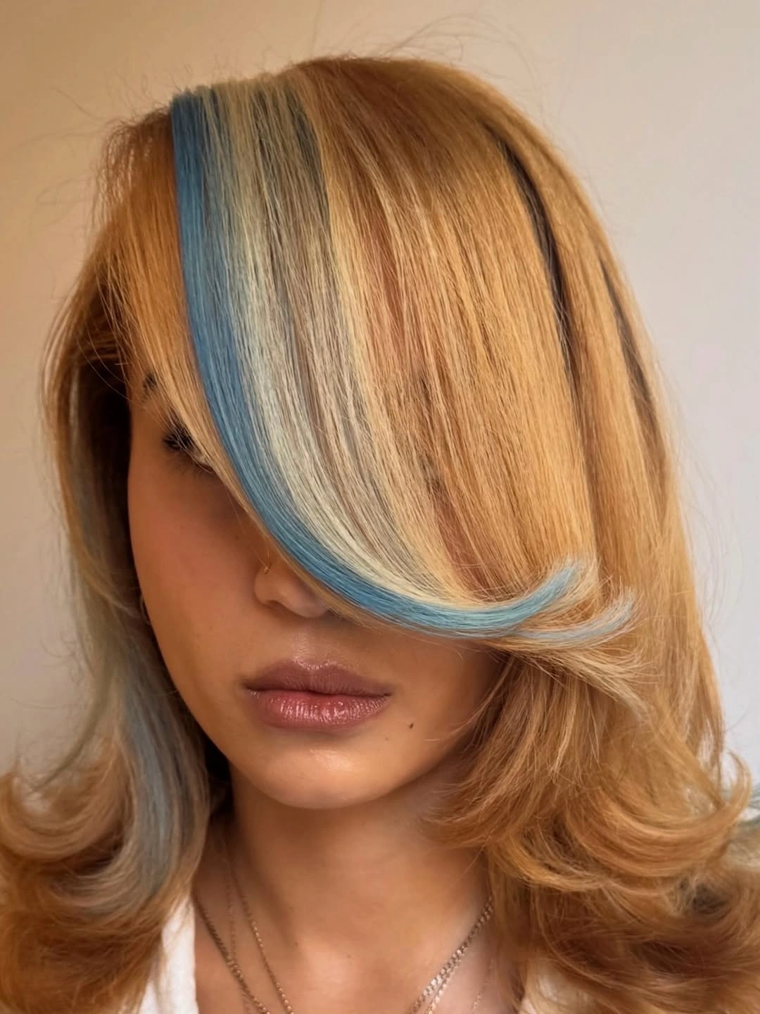 beautiful winter blonde hair color ideas Golden Blonde With A Playful Blue Accent