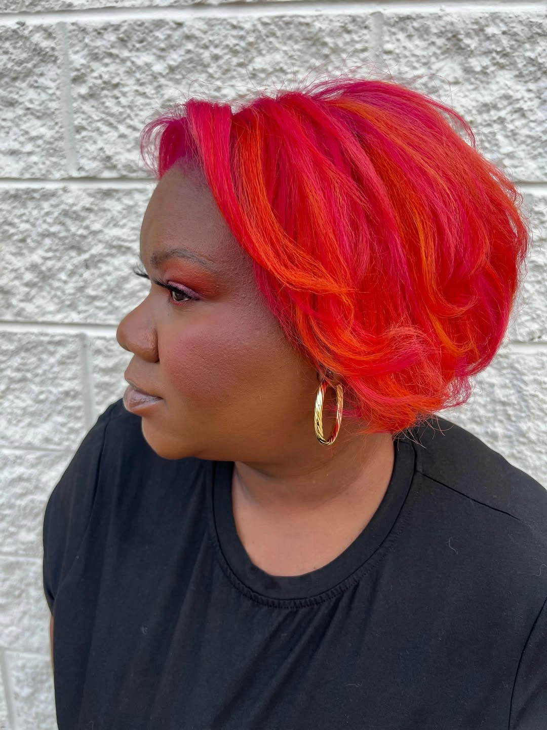 beautiful winter hair color for black women Electric Red Bob With Playful Orange Accents