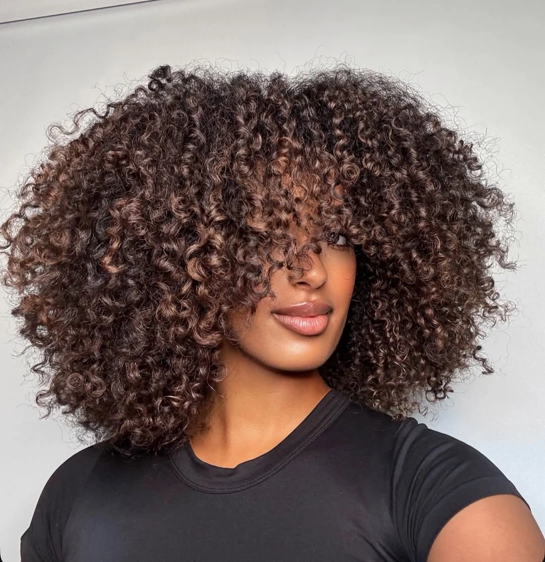 beautiful winter hair color for black women Deep Brown Curls With Soft Dimensional Shine