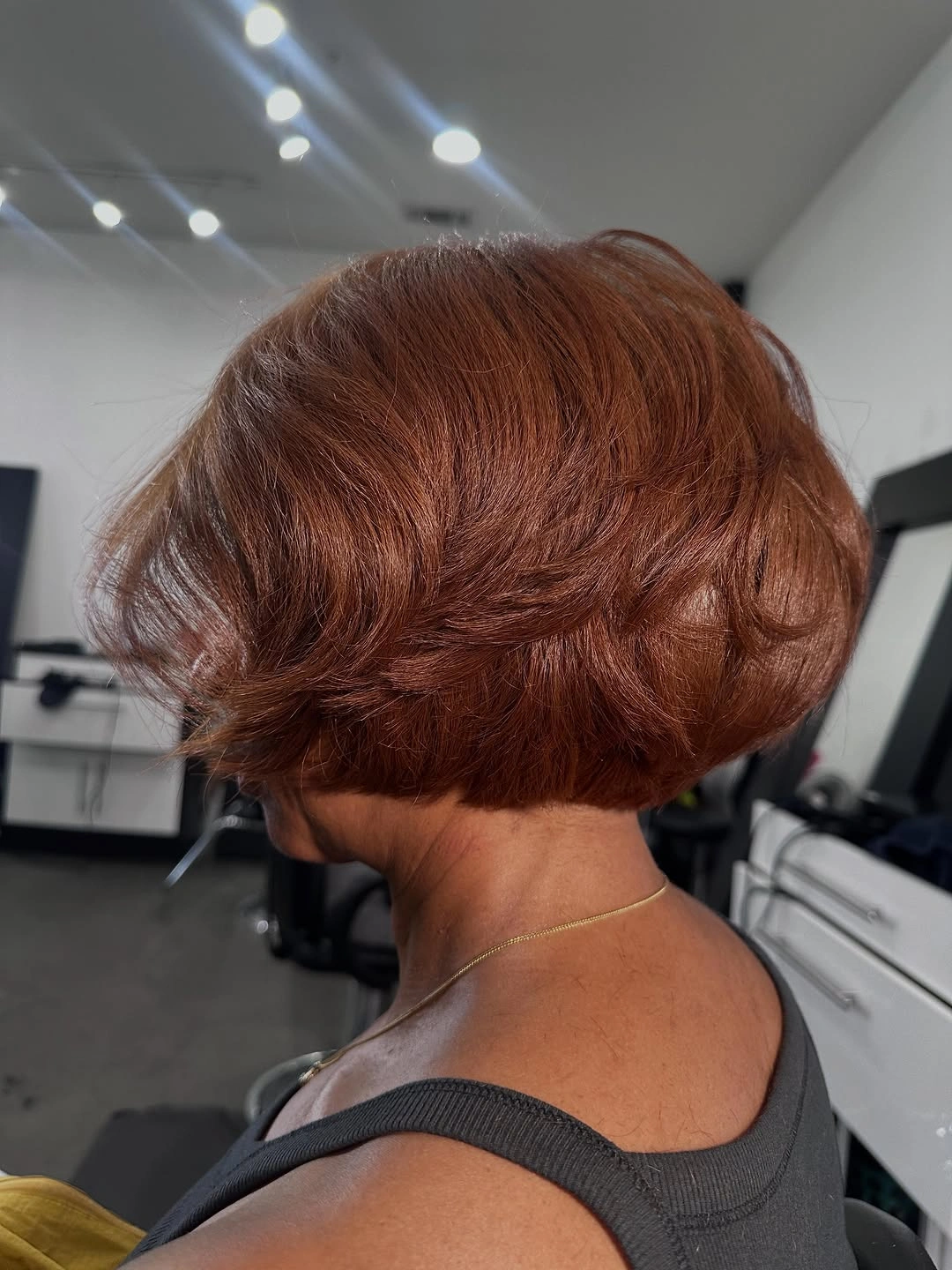 beautiful winter hair color for black women Glossy Copper Bob With Classic Volume