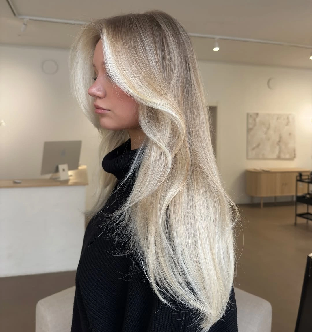blond balayage dye Silvery Vanilla Balayage With a Soft Shadow Root