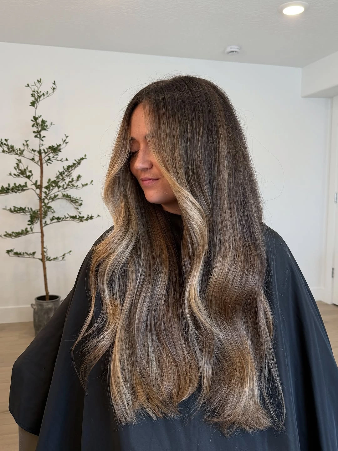 bronde balayage dye Cool Brunette With Soft Golden Ribbons