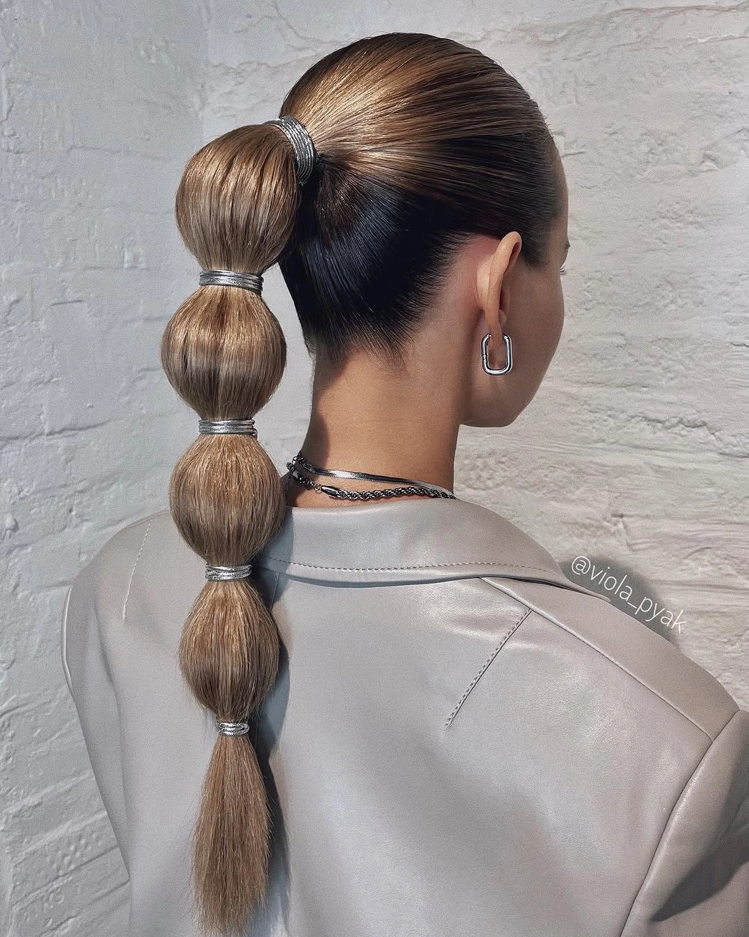 bubble braid hairstyle Sleek Bubble Ponytail With a Sculptural Finish