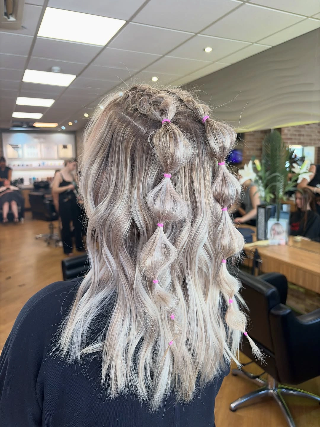 bubble braid hairstyle Soft Blonde Bubble Sections With Pink Elastics