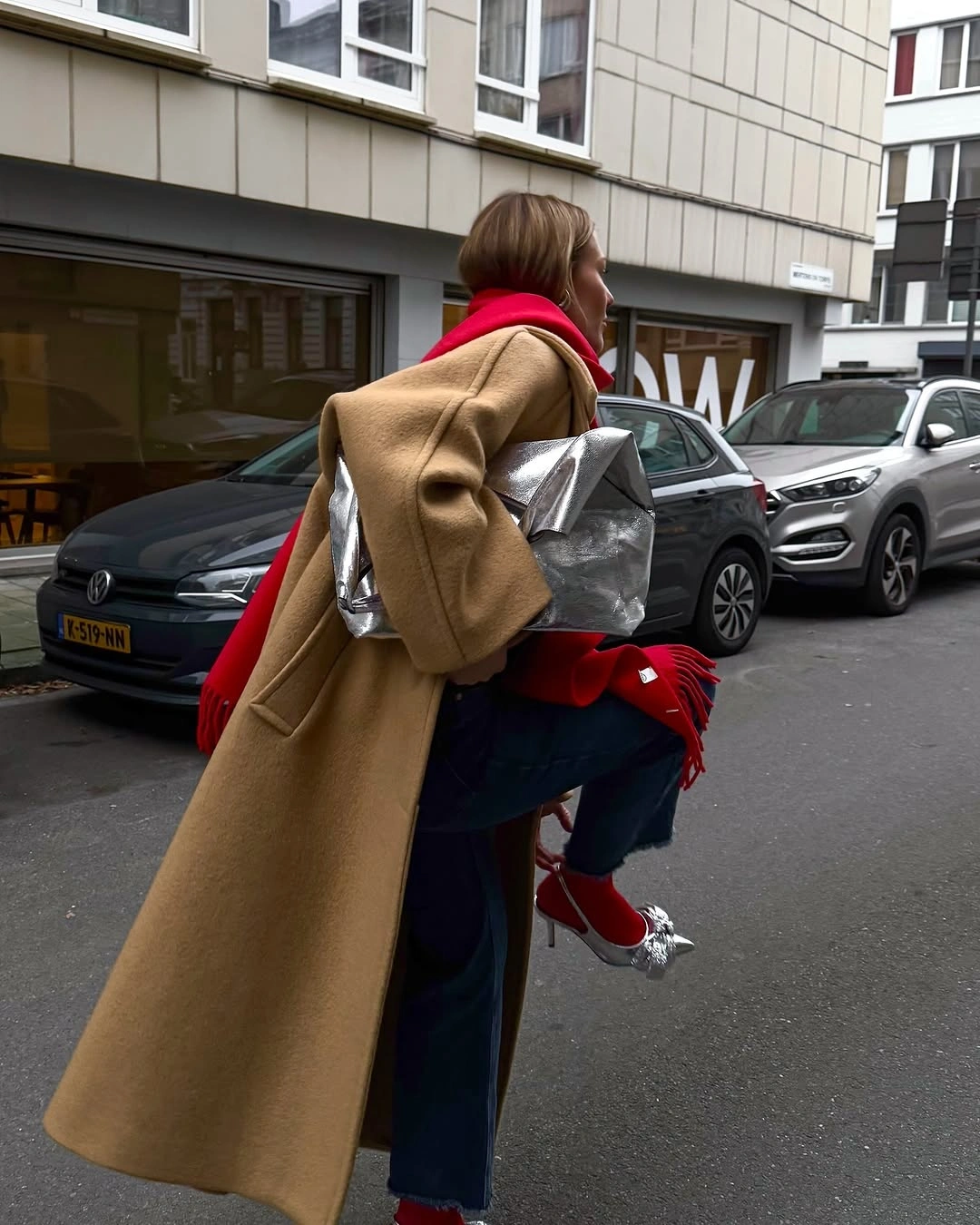 chic christmas outfits 2026 Red Scarf And Silver Accessories For Winter Street Style
