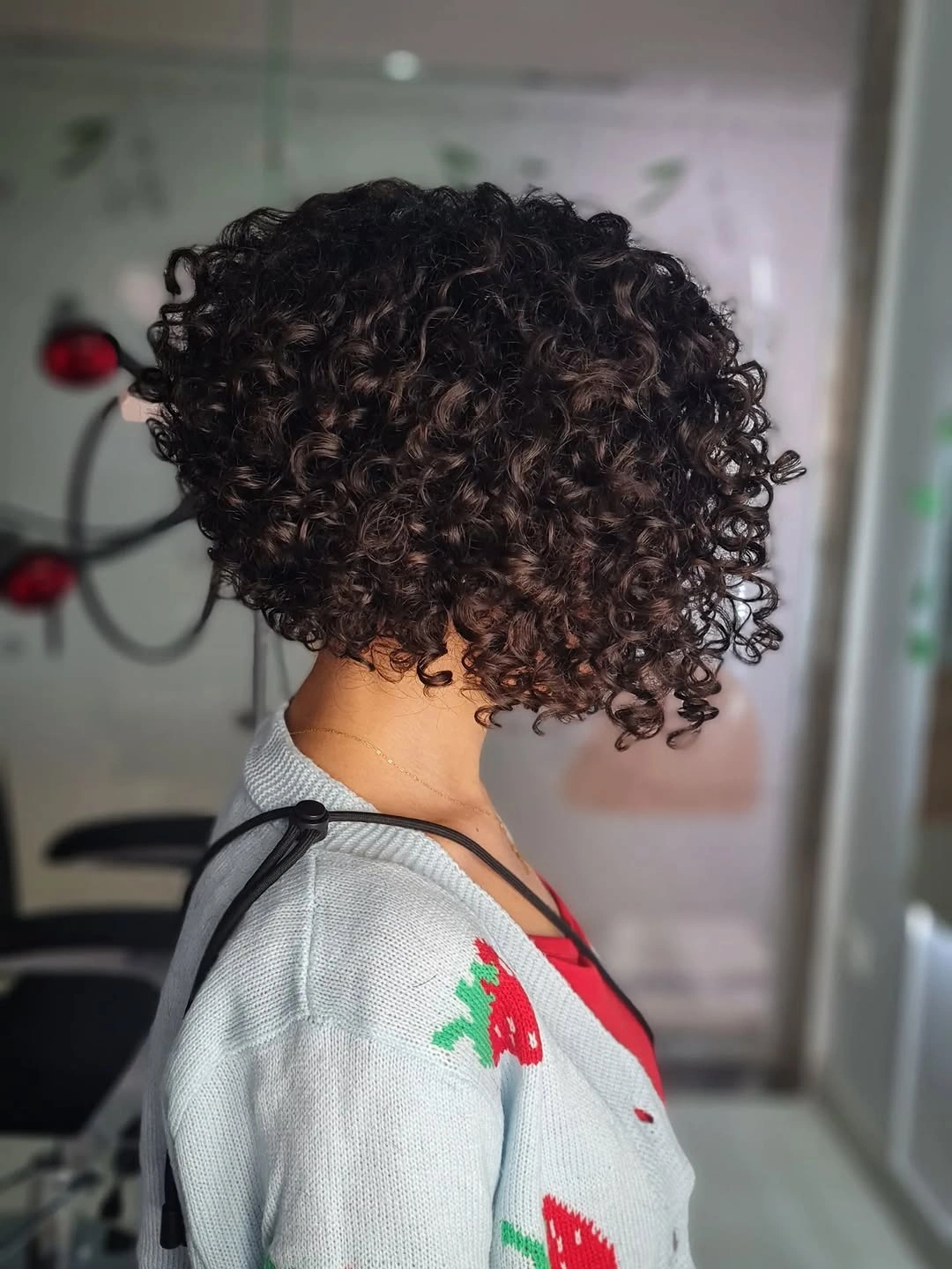 chic curly bob hair Compact Dark Curls With a Fresh Taper