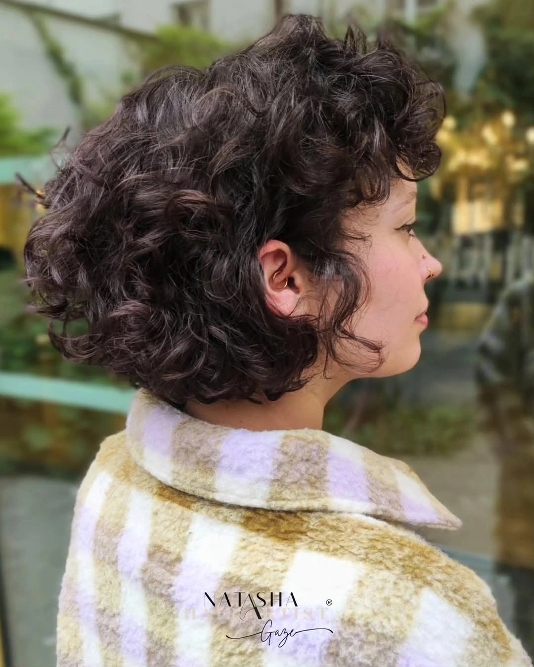 chic curly bob hair Soft Brown Curls With a Relaxed Shape
