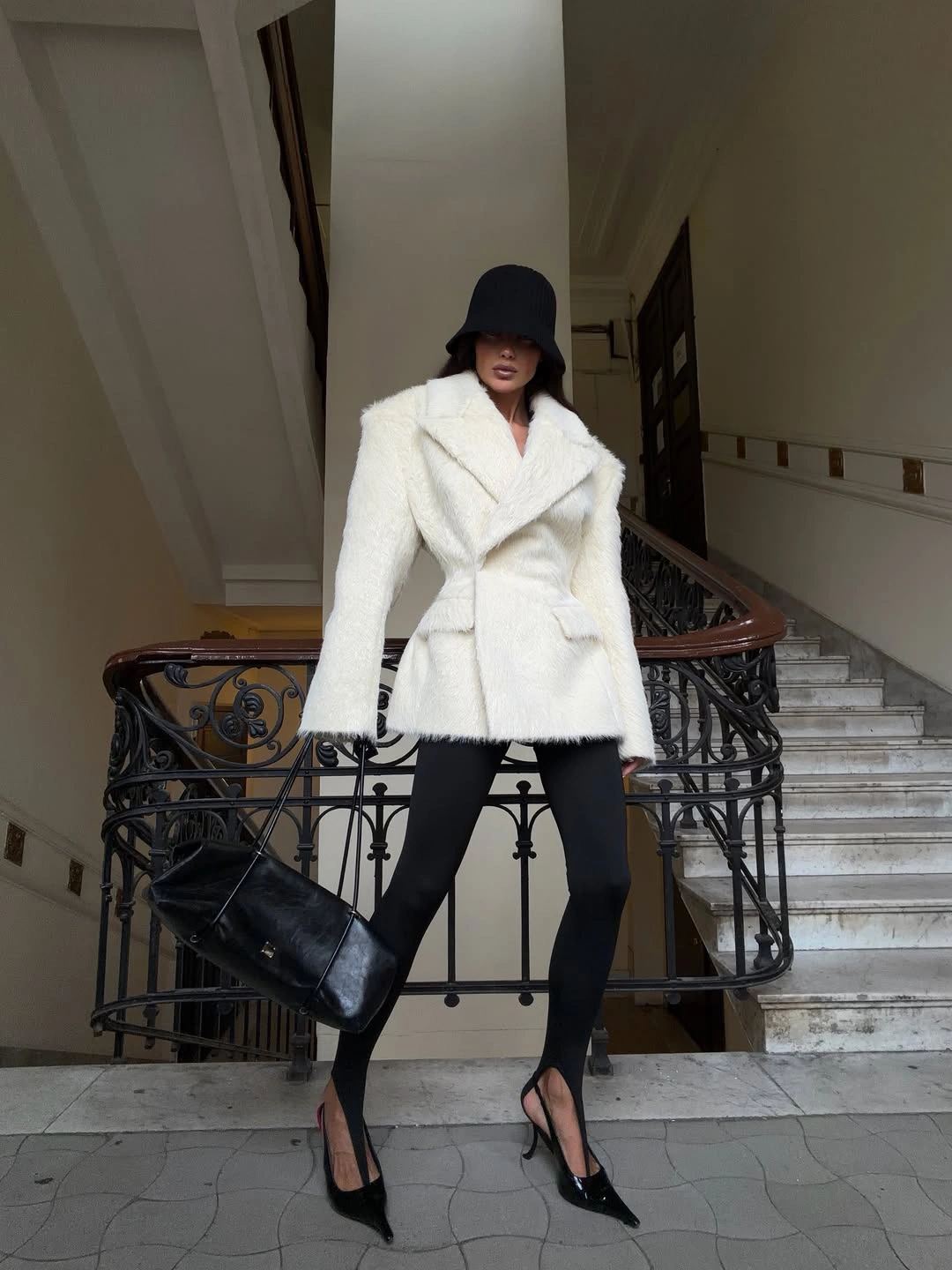 chic early winter outfits - Winter White Jacket with Sleek Black Layers