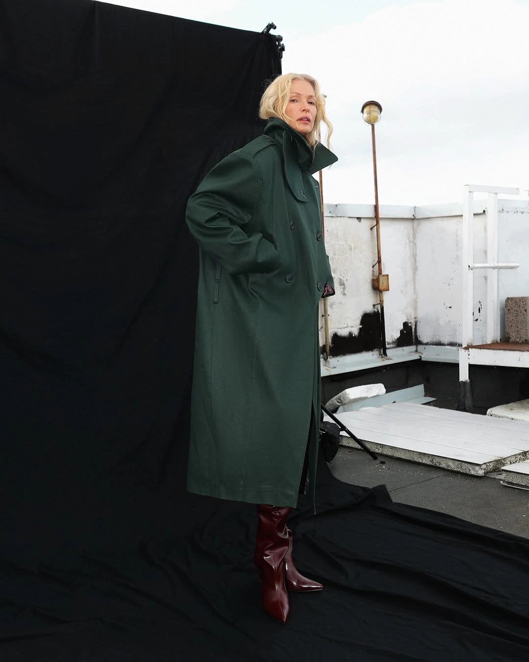 chic early winter outfits - Deep Green Statement Coat with Burgundy Boots