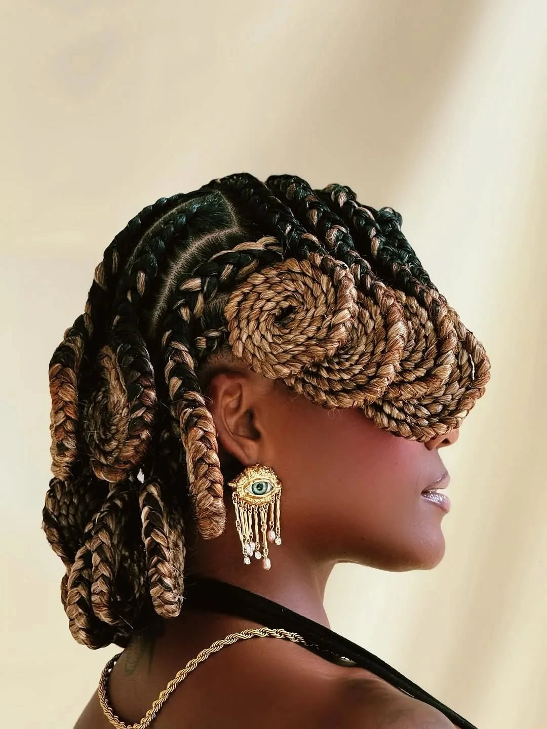 chic hairstyle ideas for black women 2027 Oversized Braided Sculptures With Golden Dimension