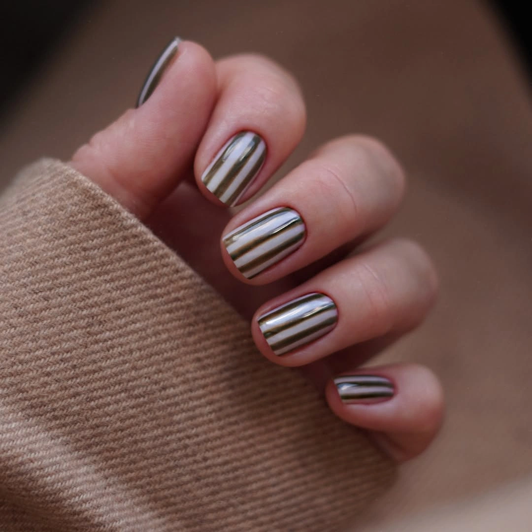 chic november nails ideas 2026 Minimal Chrome Stripes on Short Square Nails