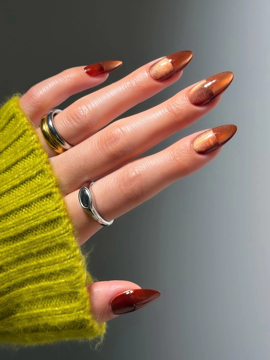 Chic November Nails Ideas 2026 Burnished Copper Cat Eye Almond Nails