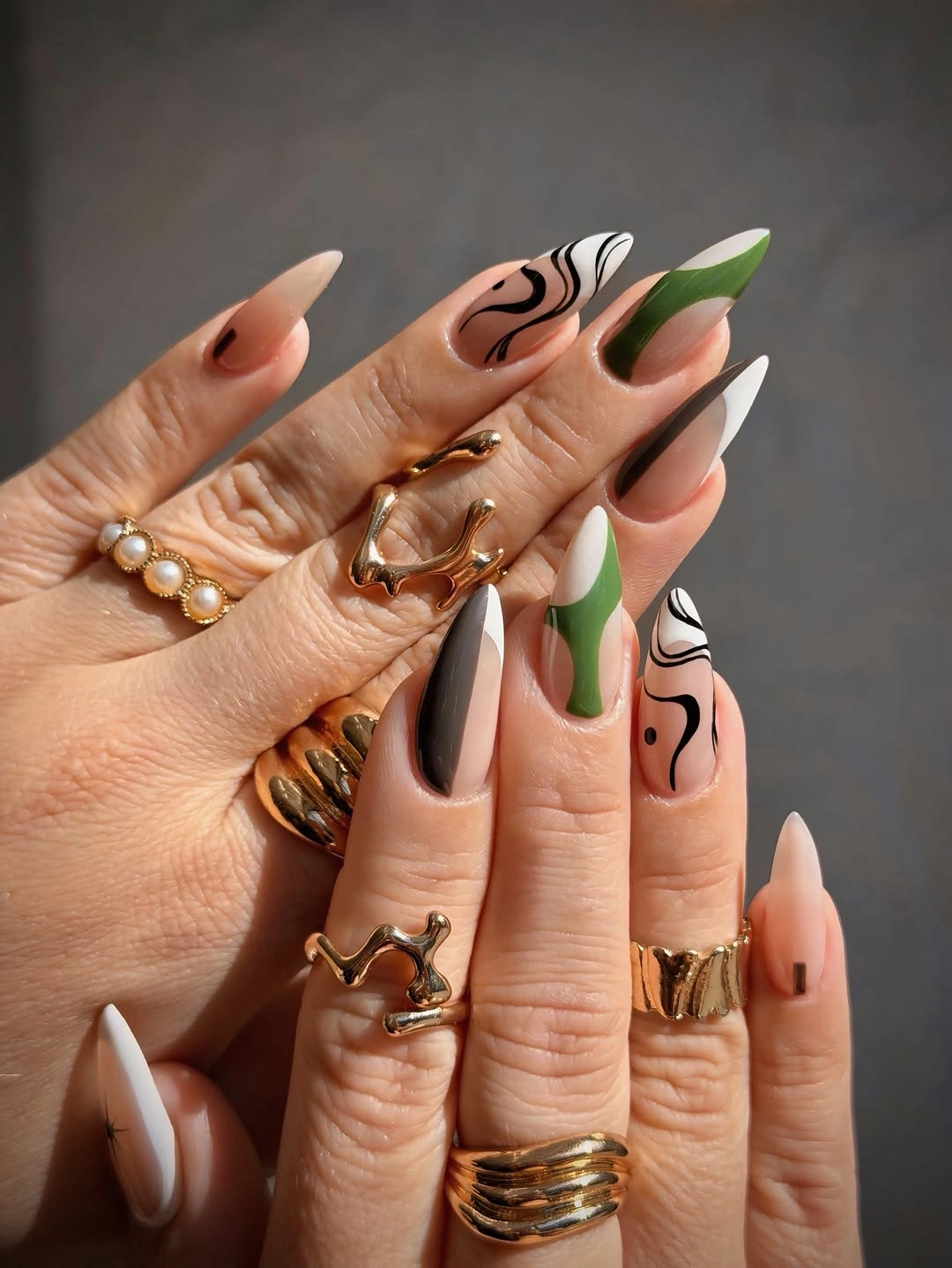 Chic November Nails Ideas 2026 Green And Black Abstract Almond Nails