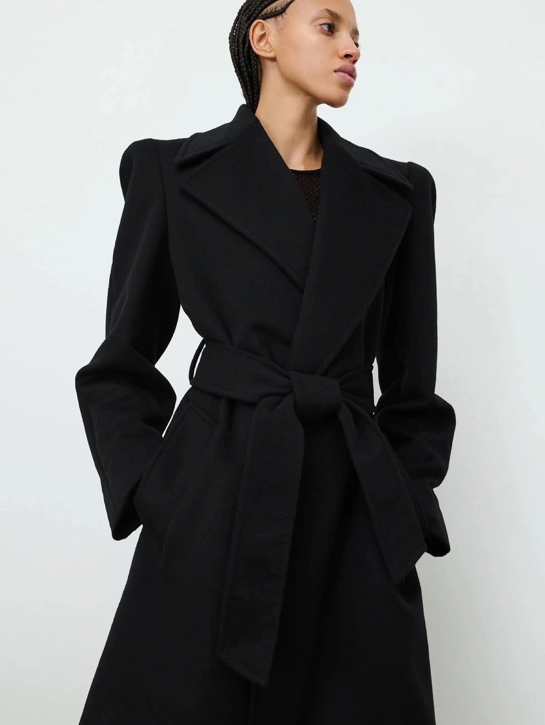chic & trendy coats 2027 - Feminine black coat with sculpted shoulders