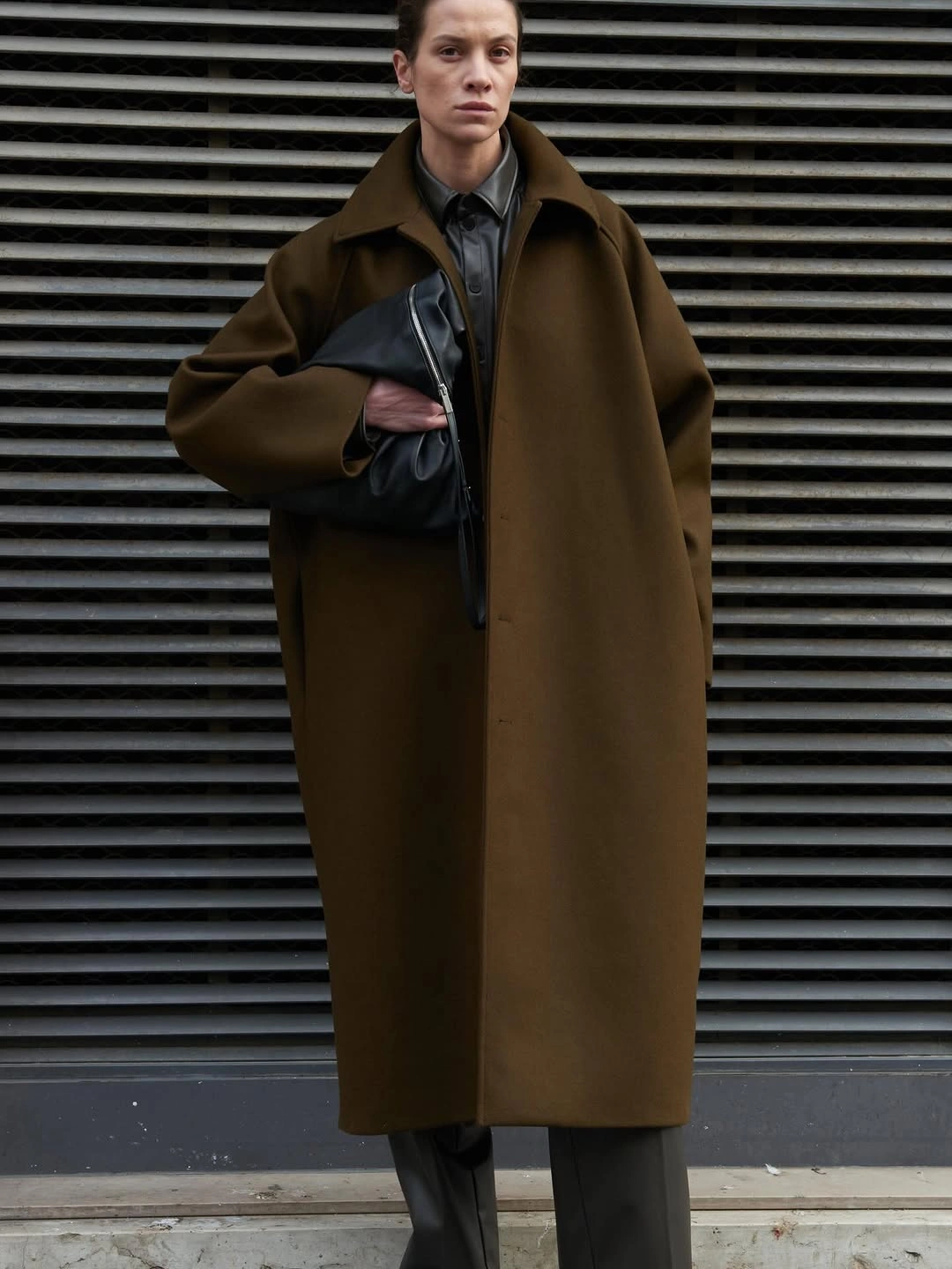 chic & trendy coats 2027 - Minimalist brown coat with leather layers