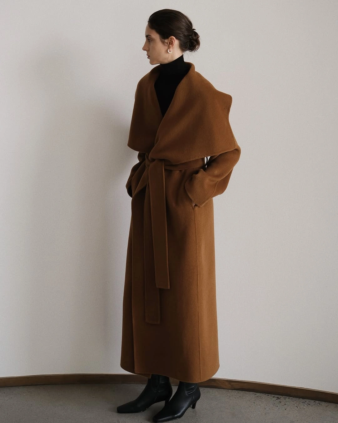 chic & trendy coats 2027 - Camel wrap coat with black turtleneck