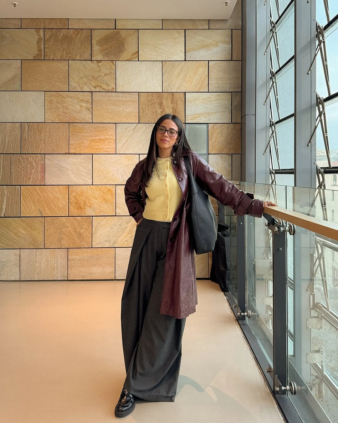 chic winter business casual outfits Burgundy Leather and Wide Trousers for a Softer Take on Tailoring