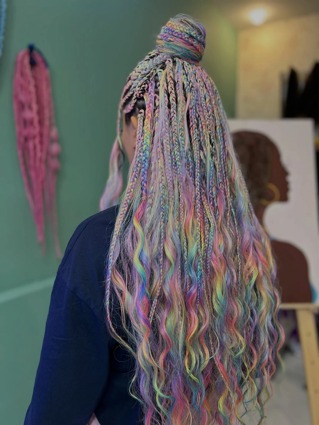 colorful braids for women Pastel Rainbow Braids With a Soft Boho Finish