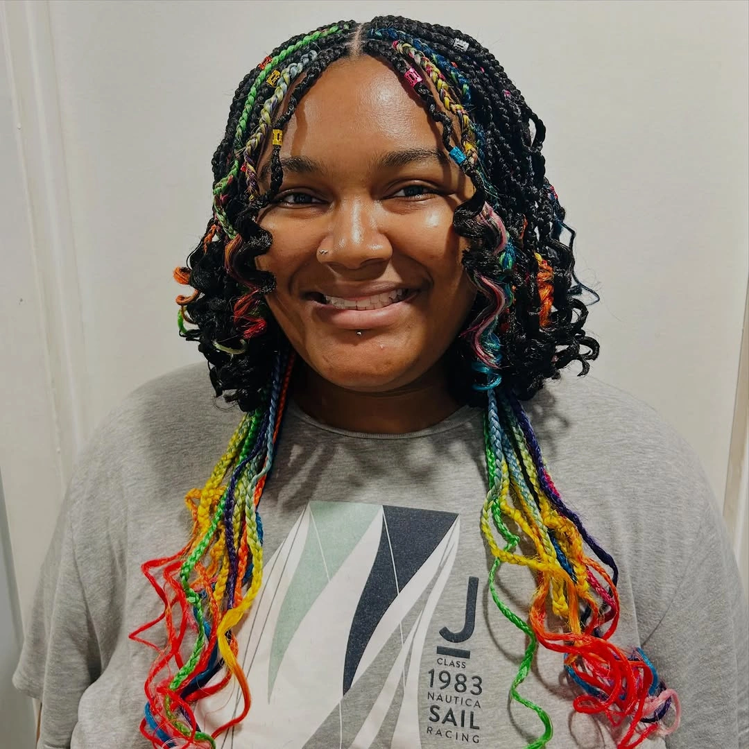 colorful braids for women Curly Rainbow Braids With Playful Face Framing