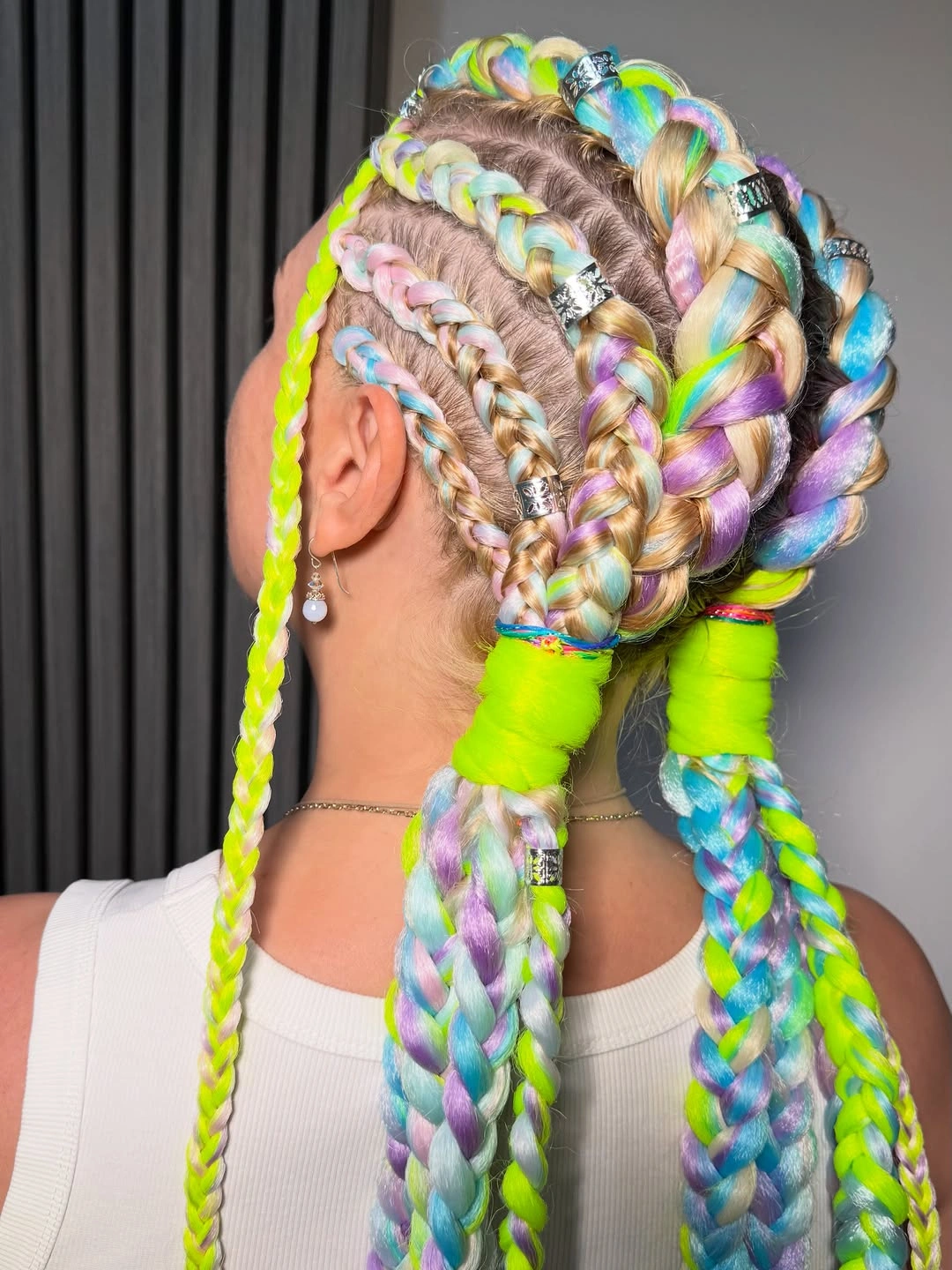 colorful braids for women Neon Rainbow Knotless Braids With Sculptural Volume