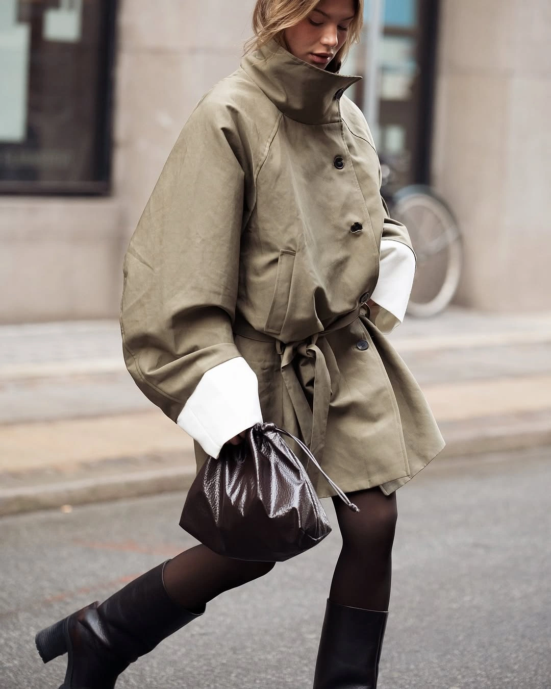 cozy late fall outfits for women A Sculptural Belted Coat for Chilly City Days