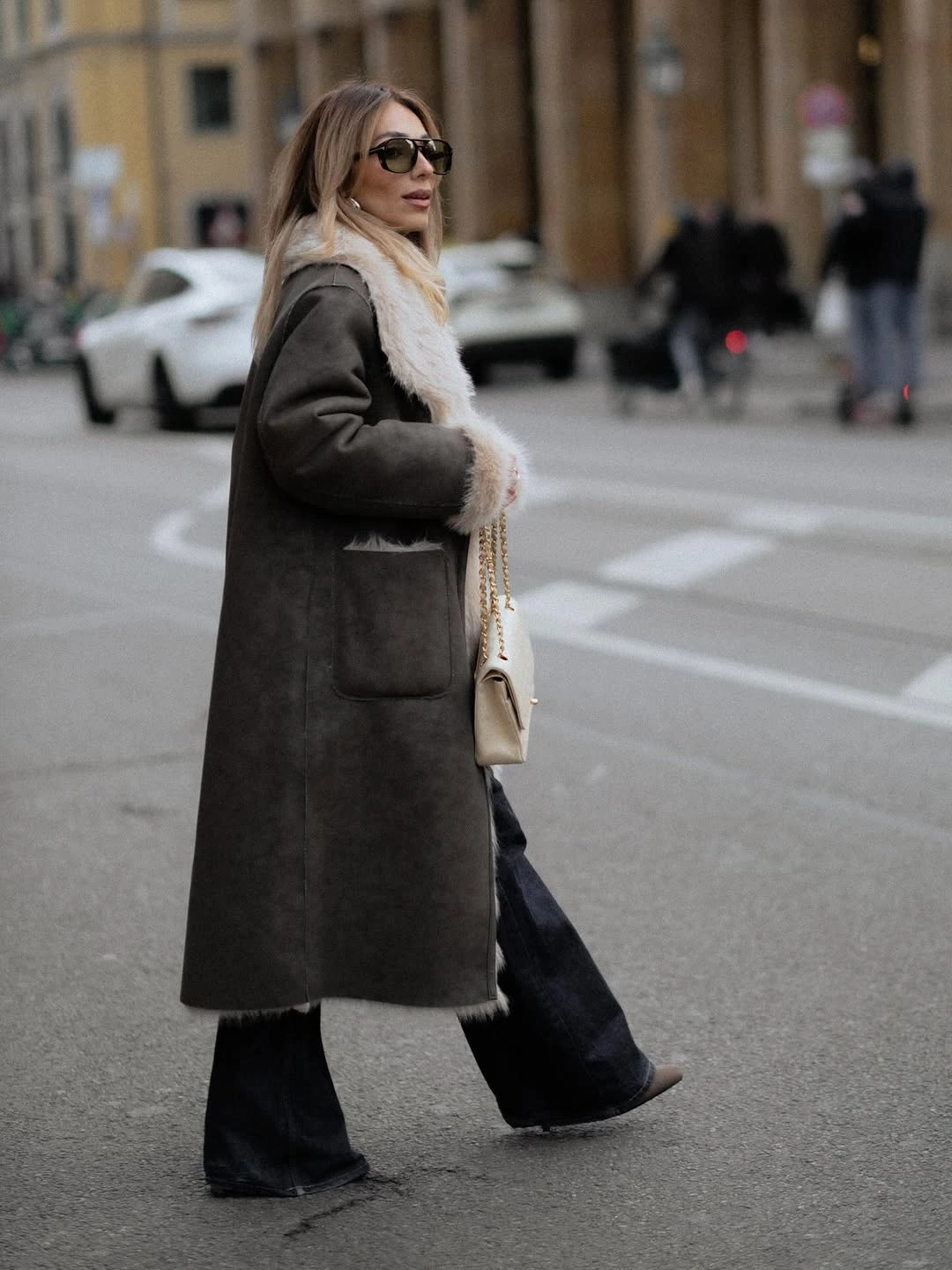 cozy november outfits ideas 2026 Shearling Coat and Wide Jeans for a Soft City Look