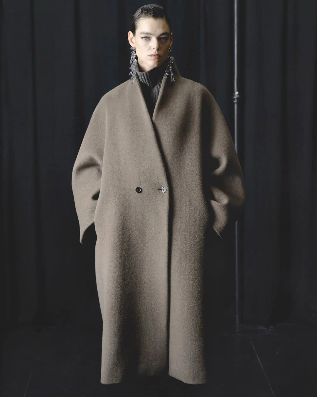 cozy november outfits ideas 2026 Oversized Camel Coat with a High Neck