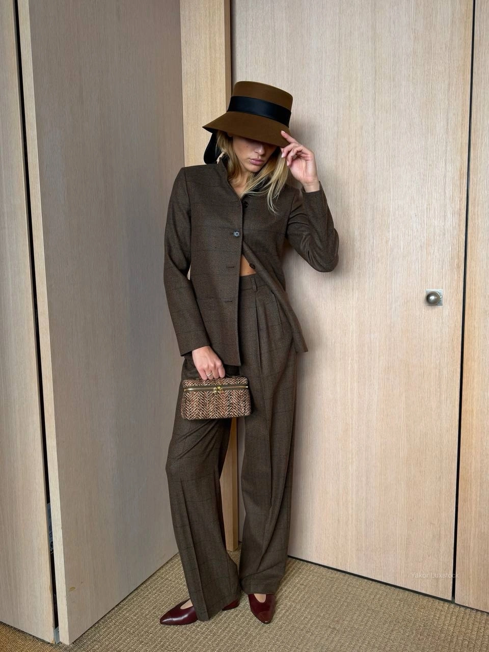 cozy november outfits ideas 2026 Brown Tailoring and a Statement Hat for Polished November Days