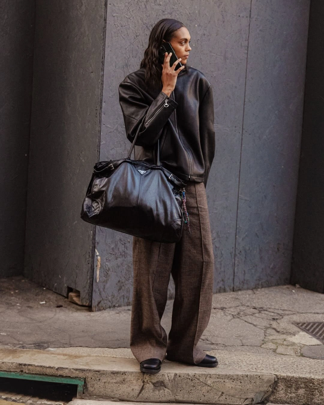 cozy november outfits ideas 2026 Leather Jacket and Tailored Trousers for a City November