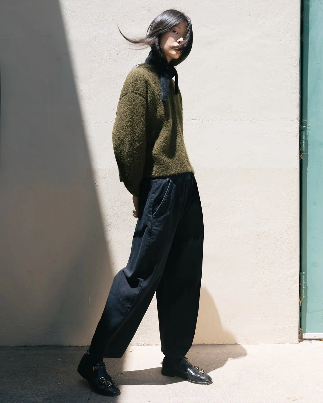 cozy november outfits ideas 2026 Olive Knit and Relaxed Trousers for Casual Comfort