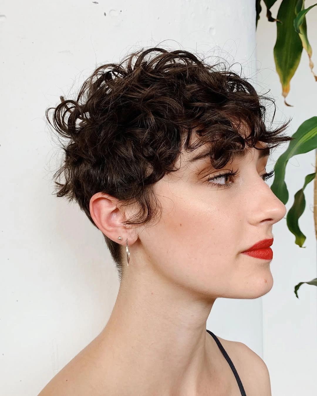 curly pixies haircut Loose Brunette Curls With A Romantic Finish