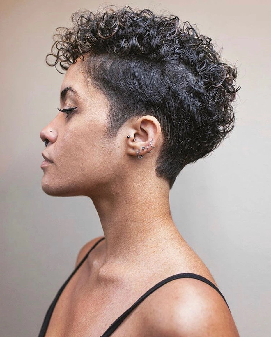 curly pixies haircut Tapered Curly Pixie With Sculpted Sides