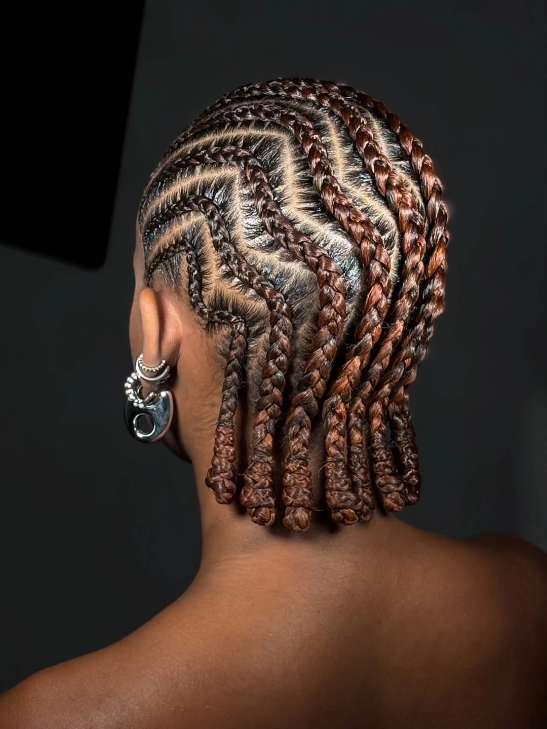 dragon braid for women Glossy Cornrow Dragon Braid With Sculpted Lines