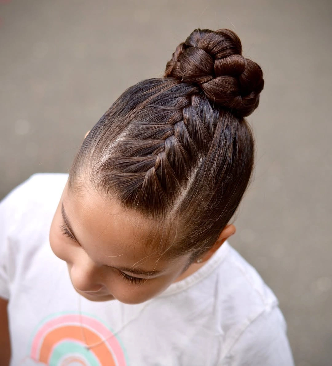 easy braid hairstyle playful braided bun for kids
