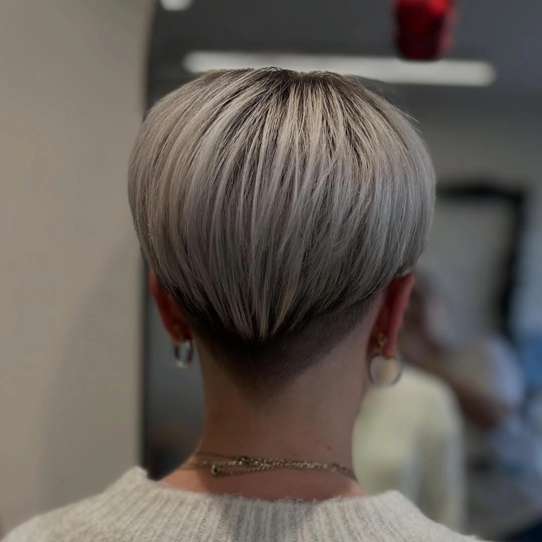 elegant and trendy haircuts for women over 40 2027 Silver Blonde Tapered Crop
