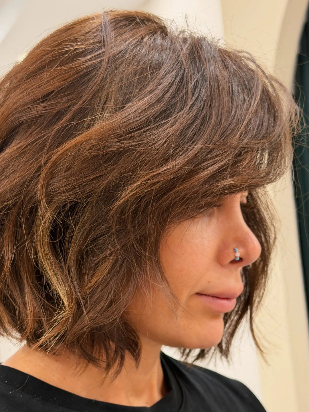 elegant and trendy haircuts for women over 40 2027 - Soft Tousled Brown Bob