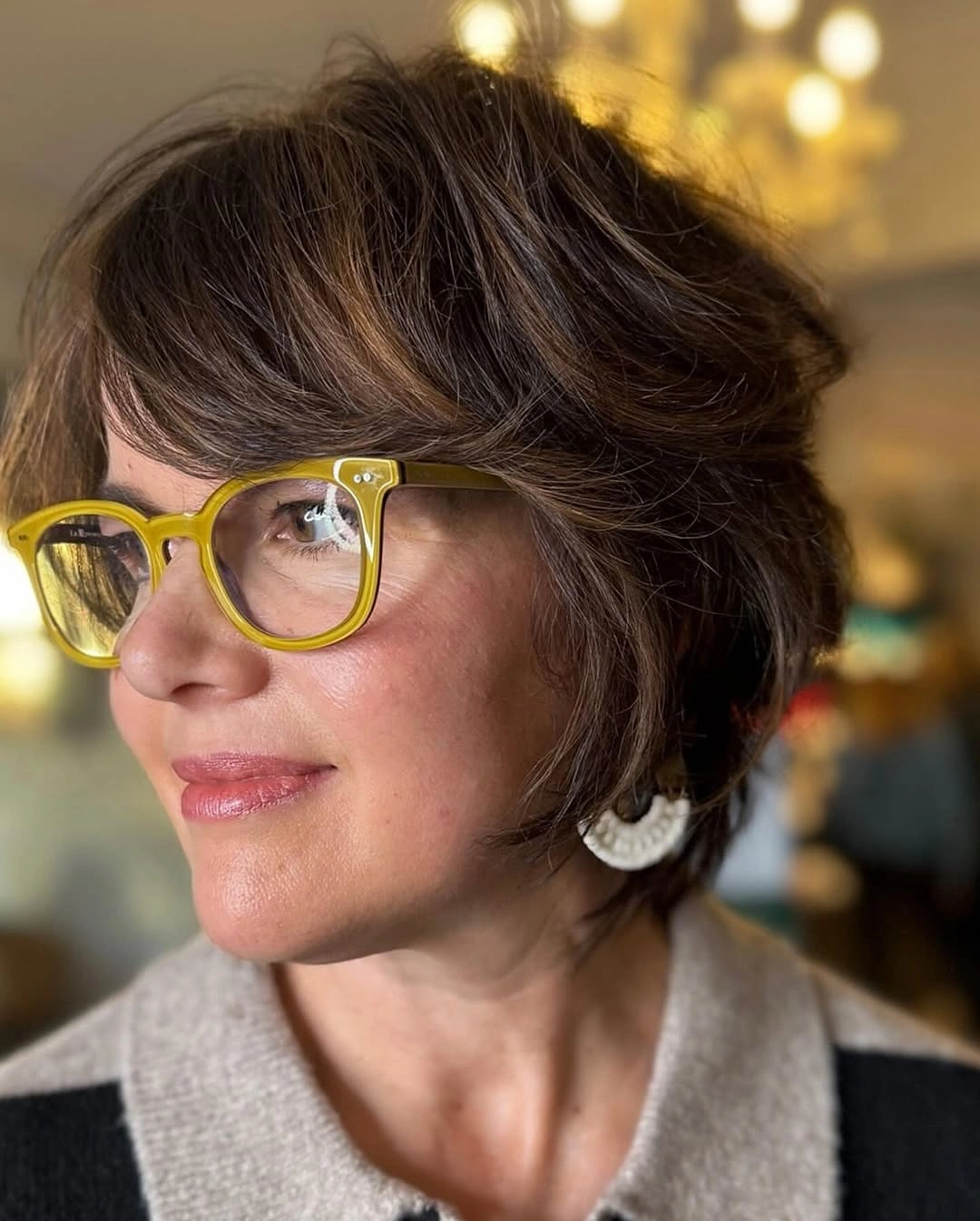 elegant and trendy haircuts for women over 40 2027 Softly Layered Brunette Pixie