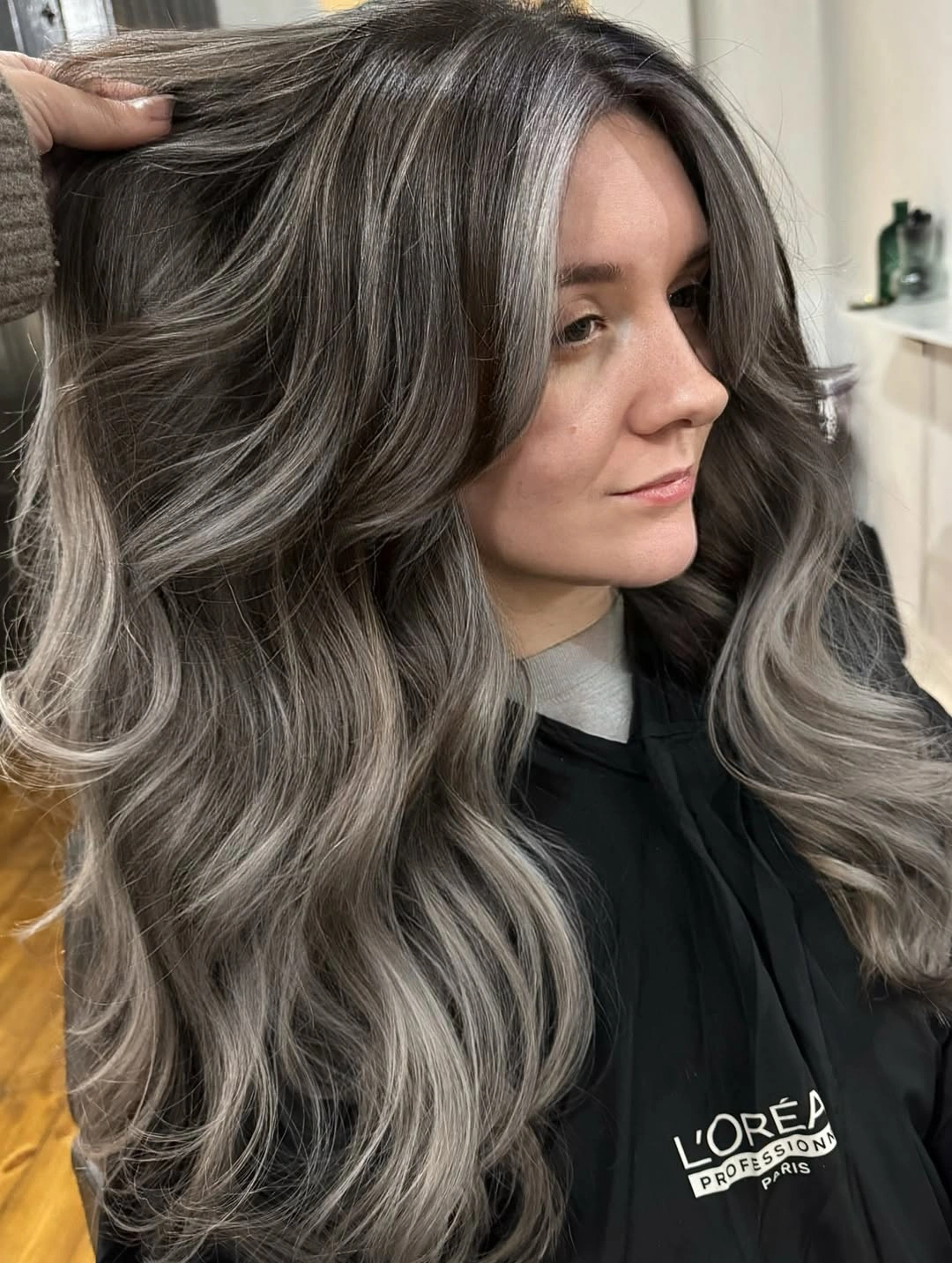 elegant and trendy haircuts for women over 40 2027 Silver Smoke Butterfly Layers