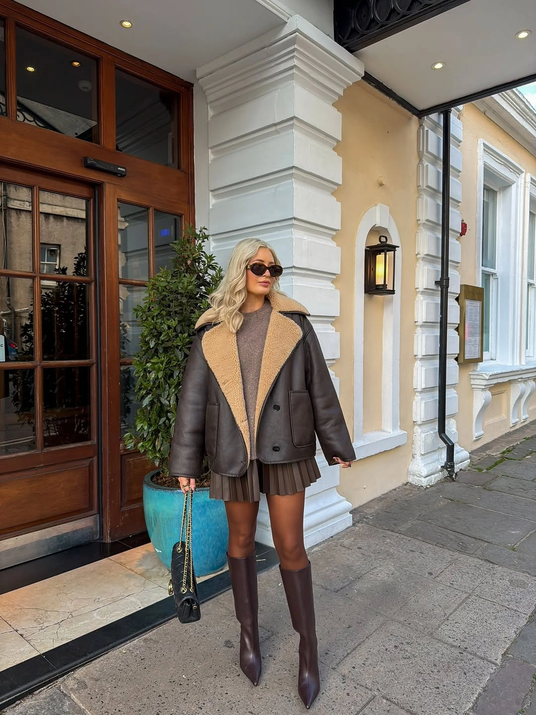 elegant winter skirt outfits for women Shearling Jacket and Pleated Skirt in Rich Winter Browns