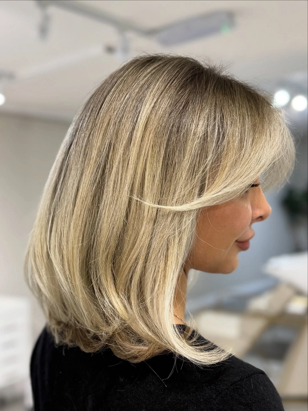 flattering lob haircut - Soft Blonde Lob With Face-Framing Movement