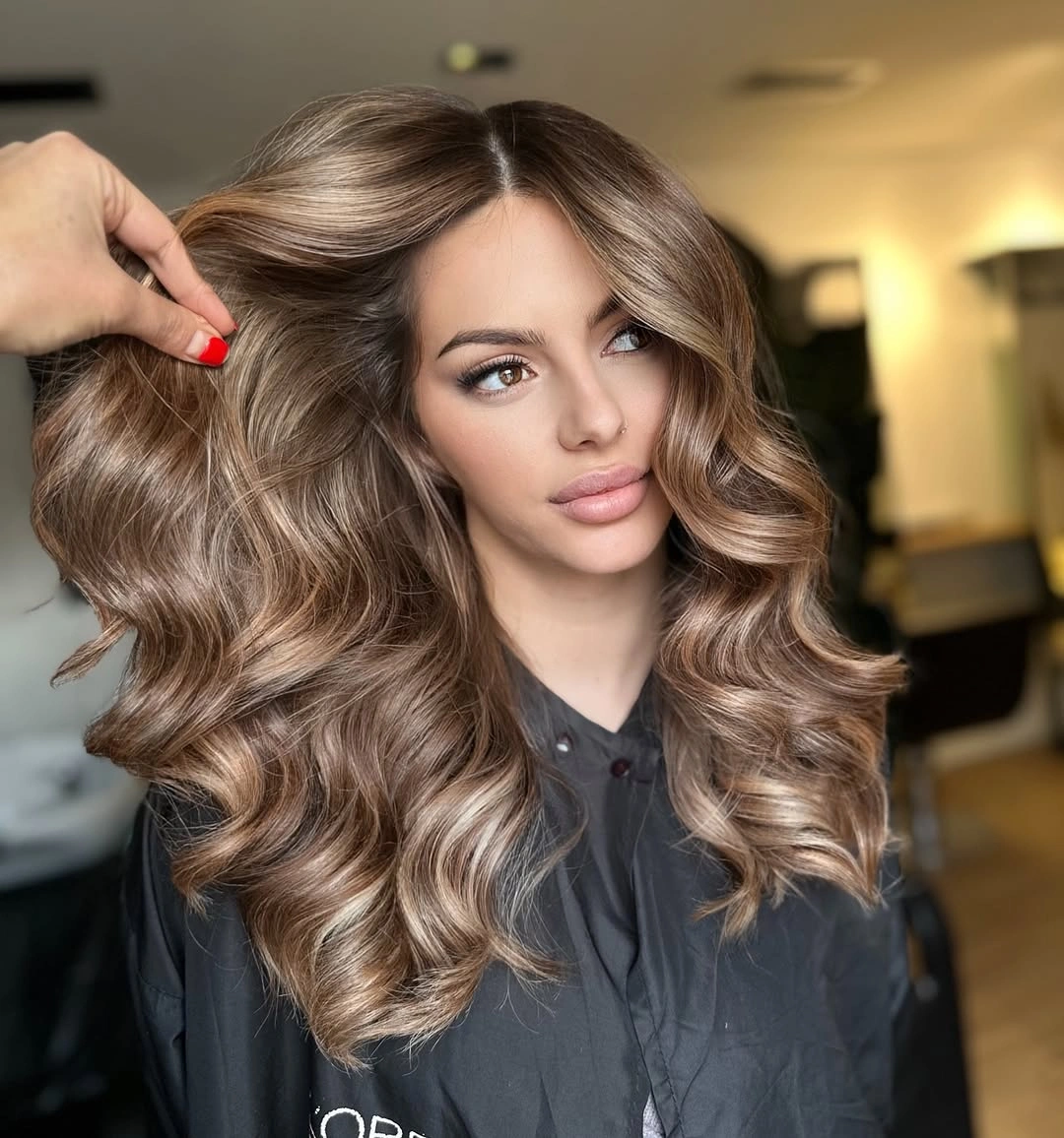 flattering november haircut ideas 2026 Glossy Long Layers With Soft Brunette Waves